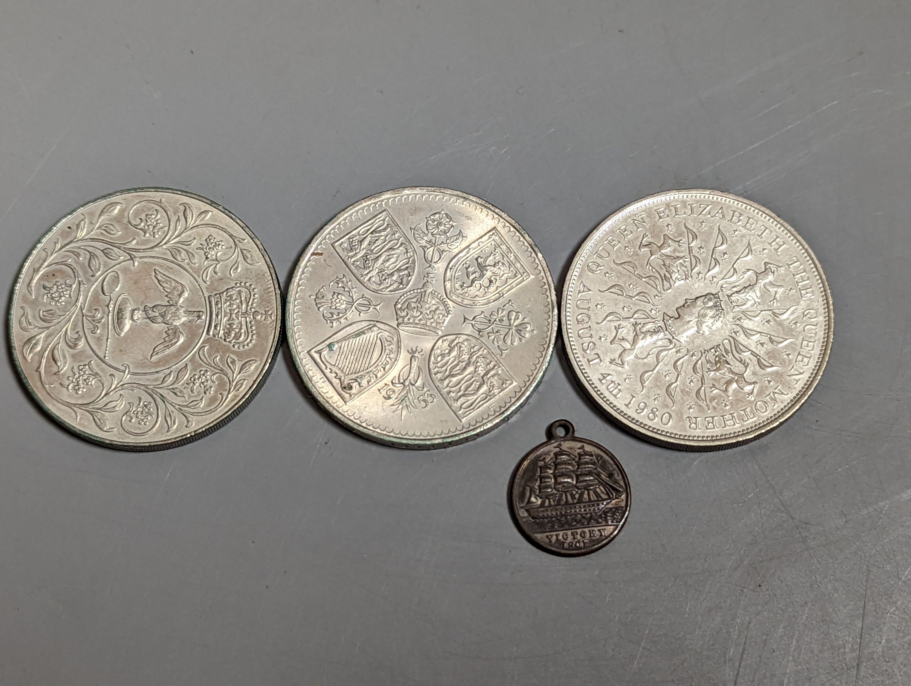 A collection of coins Victoria to Elizabeth II, together with a small coin cabinet and various reference books